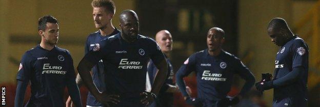 Millwall players after their defeat at Bradford