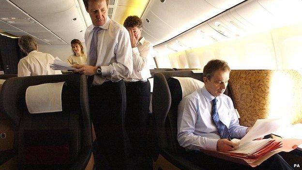 Alastair Campbell, standing, with Tony Blair in 2003