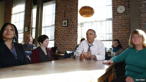 President Barack Obama speaks about his legislation proposal to offer paid sick leave for Americans while at Charmington"s Cafe in Baltimore, Maryland, 15 January 2015