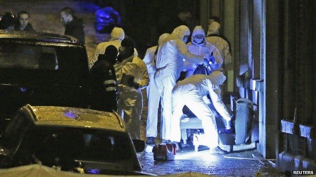 Forensic experts at the scene of the raid in Verviers. 15 Jan 2015