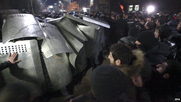 Riot police and protesters clash in Gyumri, Armenia. Photo: 15 January 2015