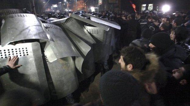 Riot police and protesters clash in Gyumri, Armenia. Photo: 15 January 2015