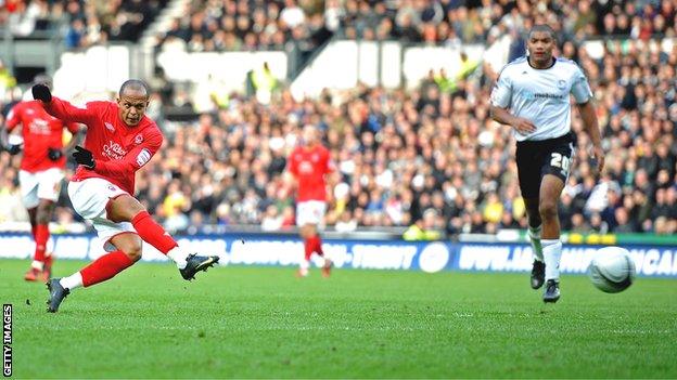 Robert Earnshaw scores for Forest against Derby at Pride Park in 2011