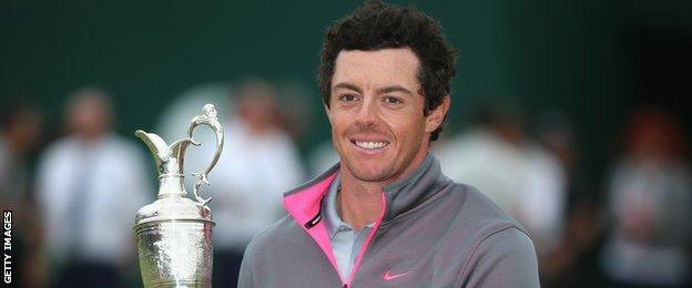 Rory McIlroy of Northern Ireland holds the Claret Jug after his two-stroke victory at The 143rd Open Championship at Royal Liverpool on July 20, 2014 in Hoylake, England.