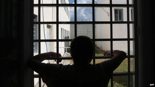 Man in a prison cell