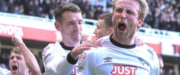 Johnny Russell celebrates Derby's opening goal against Nottingham Forest