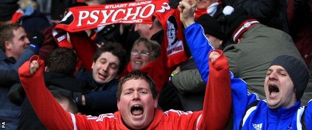 Nottingham Forest fans celebrate the win over fierce rivals Derby County