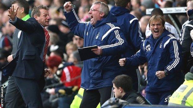 Stuart Pearce and the Nottingham Forest coaching staff celebrate the equaliser against Derby