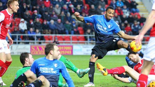 Callum Wilson hooks home Bournemouth's second goal against Rotherham