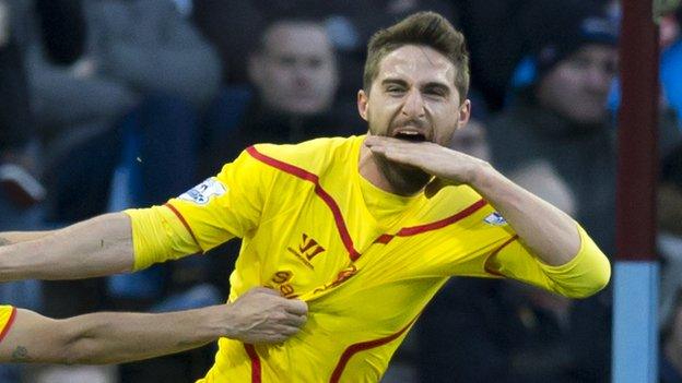 Liverpool striker Fabio Borini celebrates his goal against Aston Villa