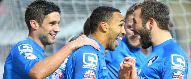 Bournemouth's players celebrate their second goal at Rotherham