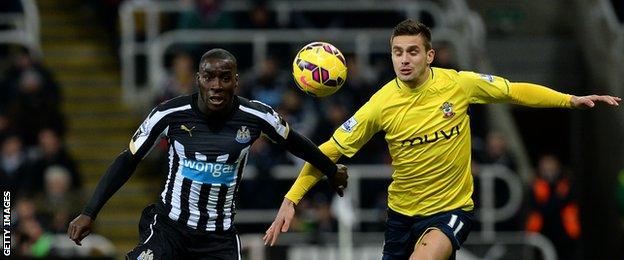 Newcastle's Massadio Haidara in action against Dusan Tadic