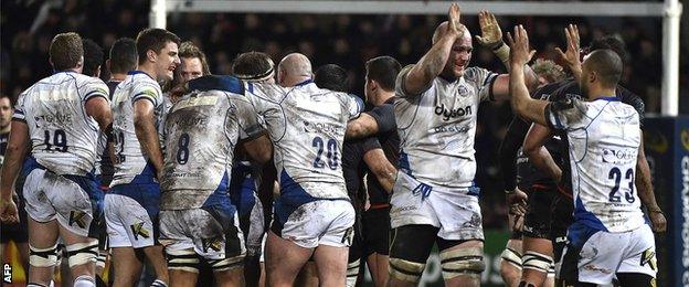 Bath's players celebrate their stunning win over Toulouse