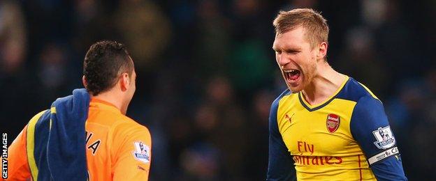 Per Mertesacker (right)