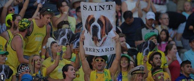 Supporters cheer for Australia's Bernard Tomic