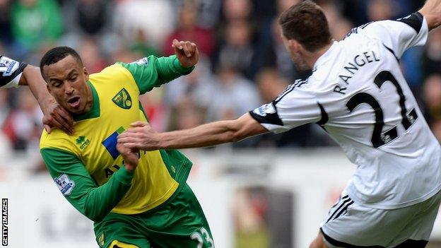 Martin Olsson (L) and Angel Rangel (R)