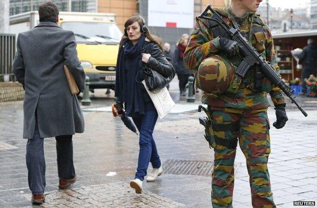 Belgian soldiers patrol outside the European Council headquarters in central Brussels, 19 Jan