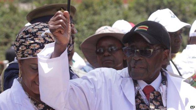 Zimbabwean President Robert Mugabe arrives on the last day of the Zanu PF 6th National Congress, in Harare, (6 December 2014)