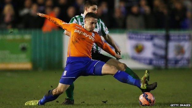 Birmingham City defender Mitch Hancox vies with Blyth Spartans' Jordan Watson