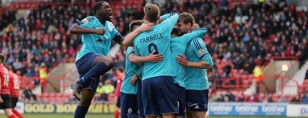 Telford players celebrate Tony Gray's second goal in the 4-0 win at Wrexham