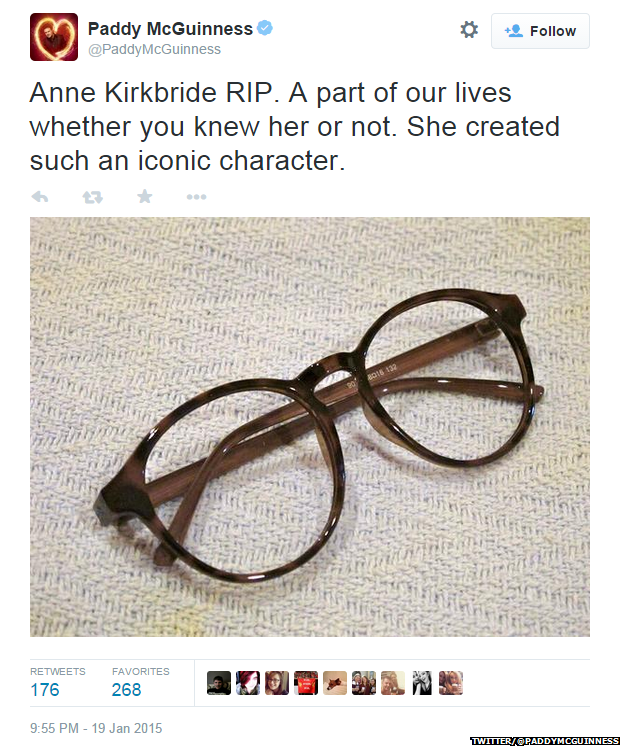 Tweet from @PaddyMcGuinness showing a picture of some spectacles and reading: "Anne Kirkbride RIP. A part of our lives whether you knew her or not. She created such an iconic character."