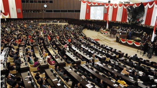 In this file picture taken on October 20, 2014, Indonesian President Joko Widodo (R) delivers his address before the members of parliament during his swearing in ceremony in Jakarta.