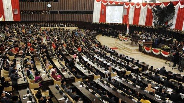 In this file picture taken on October 20, 2014, Indonesian President Joko Widodo (R) delivers his address before the members of parliament during his swearing in ceremony in Jakarta.