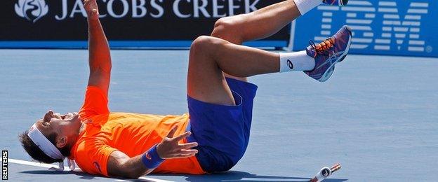 Marinko Matosevic celebrates beating Alexander Kurdyatsev