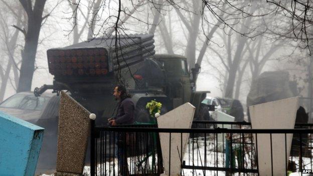 Pro-Russian rebels with Grad rocket launcher in Donetsk cemetery (20 Jan)