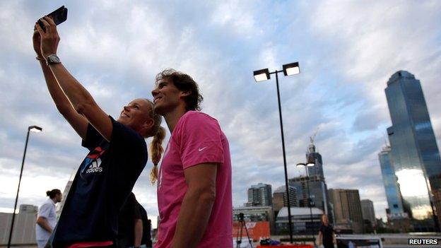 Rafael Nadal and Danish tennis player Caroline Wozniacki pose for a selfie in Melbourne