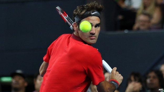 Roger Federer in action against Lleyton Hewitt in Fast4 exhibition match