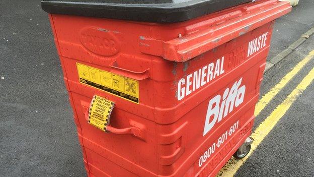 Wheelie bin with parking ticket