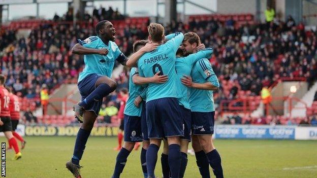 Telford players celebrate Tony Gray's second goal in the 4-0 win at Wrexham