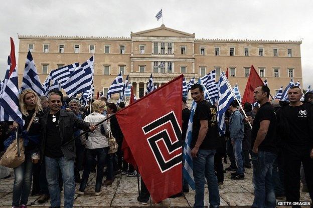 Supporters of the Golden Dawn ultra-nationalist party gather in front of the Greek parliament in Athens on 4 June 2014.