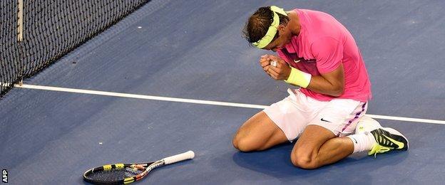 Rafael Nadal celebrates beating Tim Smyczek