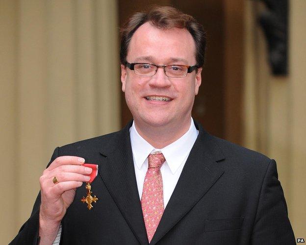 Russell T Davies receiving his OBE in 2008.