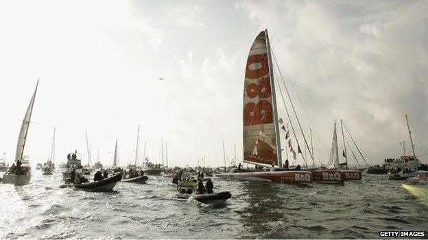 Ellen MacArthur returning to Falmouth harbour in Cornwall in February 2005 after her record-breaking solo, non-stop, round-the-world voyage