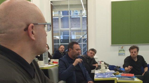 Author David Stubbs looks on as Stephen Mallinder talks with event organiser Dr Uwe Schütte on the right