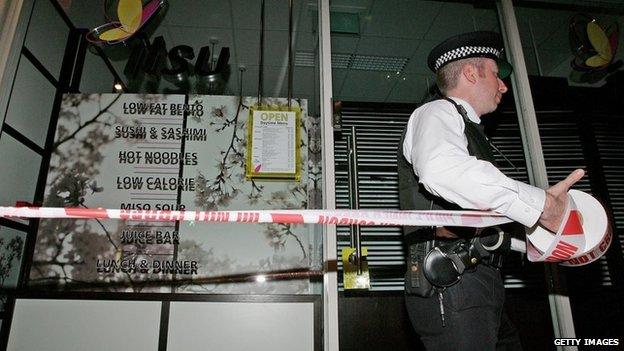 Police at the Itsu sushi bar in London