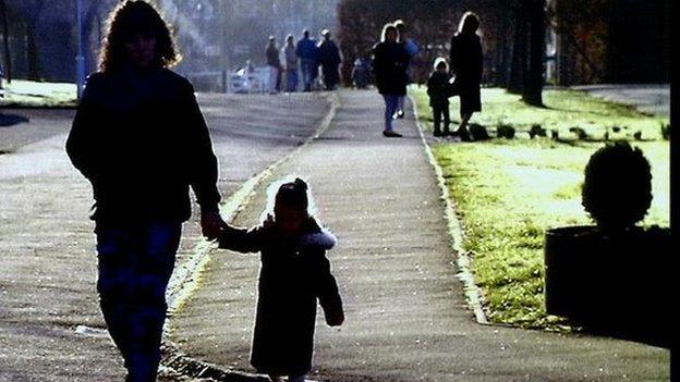 Mother and child in silhouette