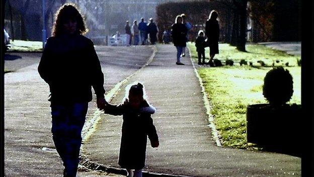 Mother and child in silhouette