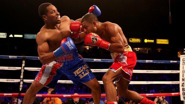 Kell Brook (right) landing a right hook on Shawn Porter in the IBF welterweight title