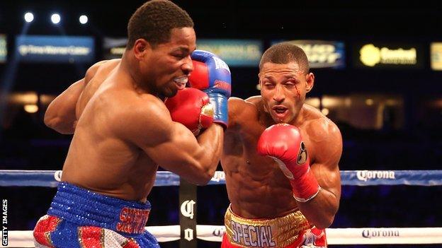 Kell Brook (right) landing a right hook on Shawn Porter in the IBF welterweight title in August 2014