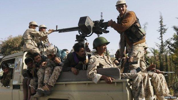 Houthi fighters patrol Sanaa, Yemen (22 January 2015)