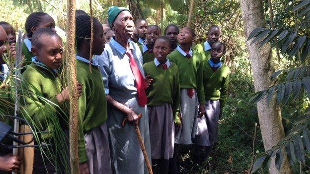 Priscilla Sitienei and classmates standing outside