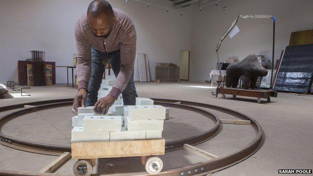 Theaster Gates at work in the studio