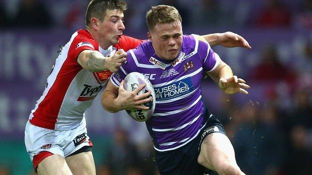 Joe Burgess (r) in action during last season's Grand Final