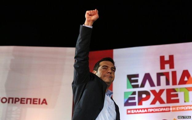 Alexis Tsipras waves to supporters during a campaign rally in central Athens, 22 January 2015