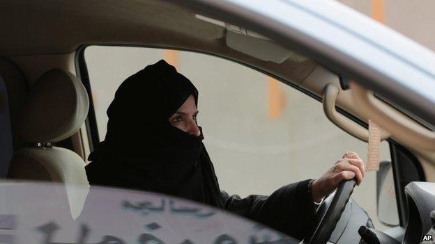 File photo: Aziza Yousef drives a car on a highway in Riyadh, Saudi Arabia, 29 March 2014