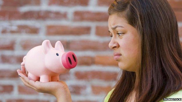 Girl with piggy bank